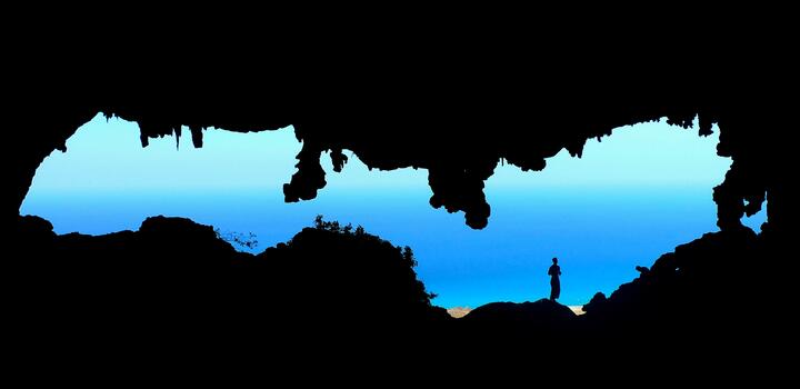 Looking out of the mouth of Hoq cave. Looking out of the mouth of Hoq cave.